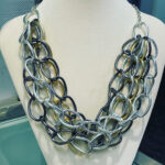 Silver and Gold tone and Gun Metal Five Strand Necklace